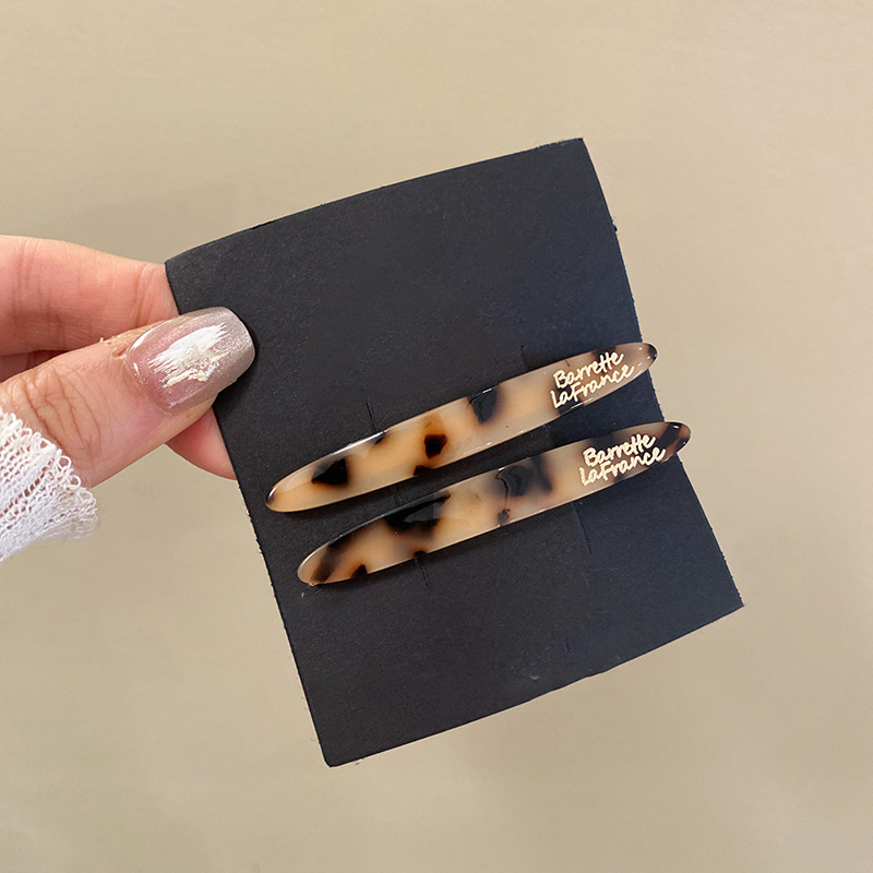 Horquilla florecilla simple primavera y verano nuevo estilo retro moda todo fósforo clip lateral de una palabra sentido de alta calidad temperamento exquisito accesorios para el cabello