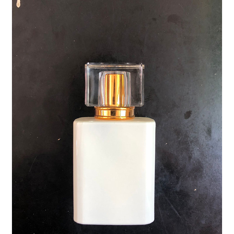 En stock cubierta de acrílico B015-50ML100ml cuadrado transparente vidrio perfume spray sub-embalaje cosmético botella vacía