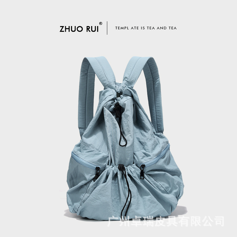 Corea del Sur Dongdaemun nuevo cordón mochila mujer casual gran capacidad estudiante mochila versátil mochila de nylon ligero