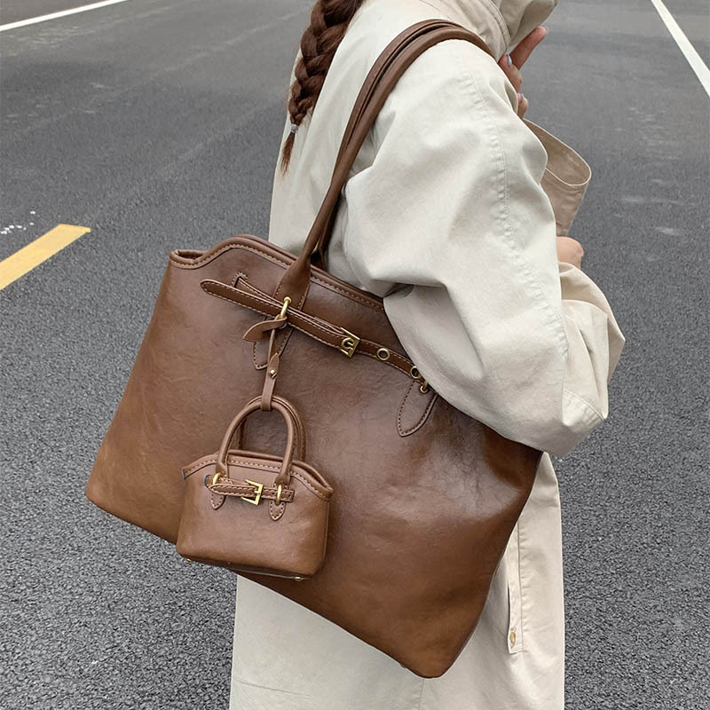 2025 otoño y invierno nueva gran capacidad de transporte bolsa bolsa de mano maletín retro bolso de hombro bolsa de compras de alta calidad