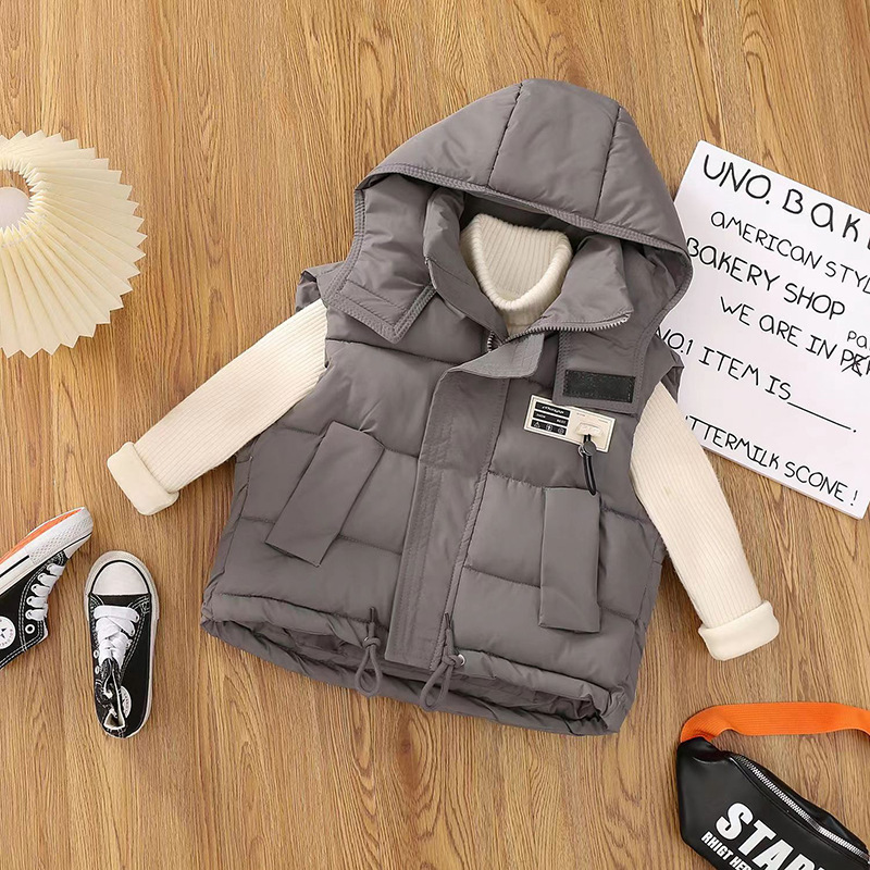 Chaleco de algodón infantil primavera y otoño 2025 nuevo otoño y invierno niños pequeños y medianos niñas chaleco de algodón plumón hombro vestido exterior