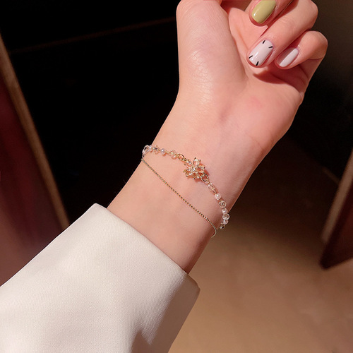 ins trendy titanium steel double-layered pearl bracelet for women super flash exquisite zircon flower pendant bracelet Korean new hand accessories