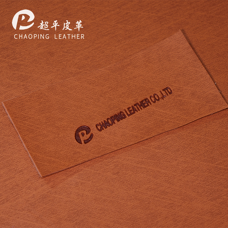 1.2mm肤感水刺布商标压变太空皮革柔软环保油蜡箱包沙发面料现货
