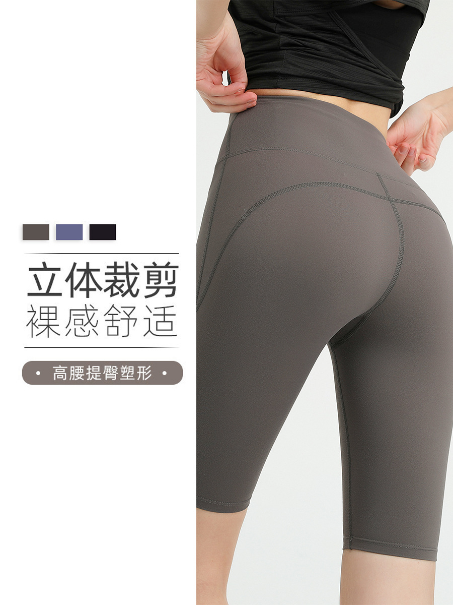 Pantalones de yoga transfronterizos europeos y americanos de cintura alta con efecto levanta glúteos y bolsillos para mujer, shorts deportivos elásticos transpirables de secado rápido y ajuste ceñido.