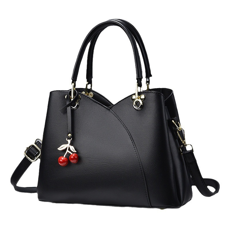 Bolso de mano, bolso de gran capacidad, bolso de 2025 nuevo bolso de mujer de color sólido, bolso de madres, bolso de moda de mediana edad, bolso de mochila versátil