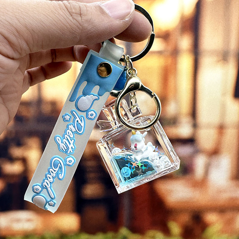 Púrpura estrella de cinco puntas líquido Quicksand llavero chica corazón flor de cerezo aceite colgante lindo tridimensional mochila adornos para mujeres