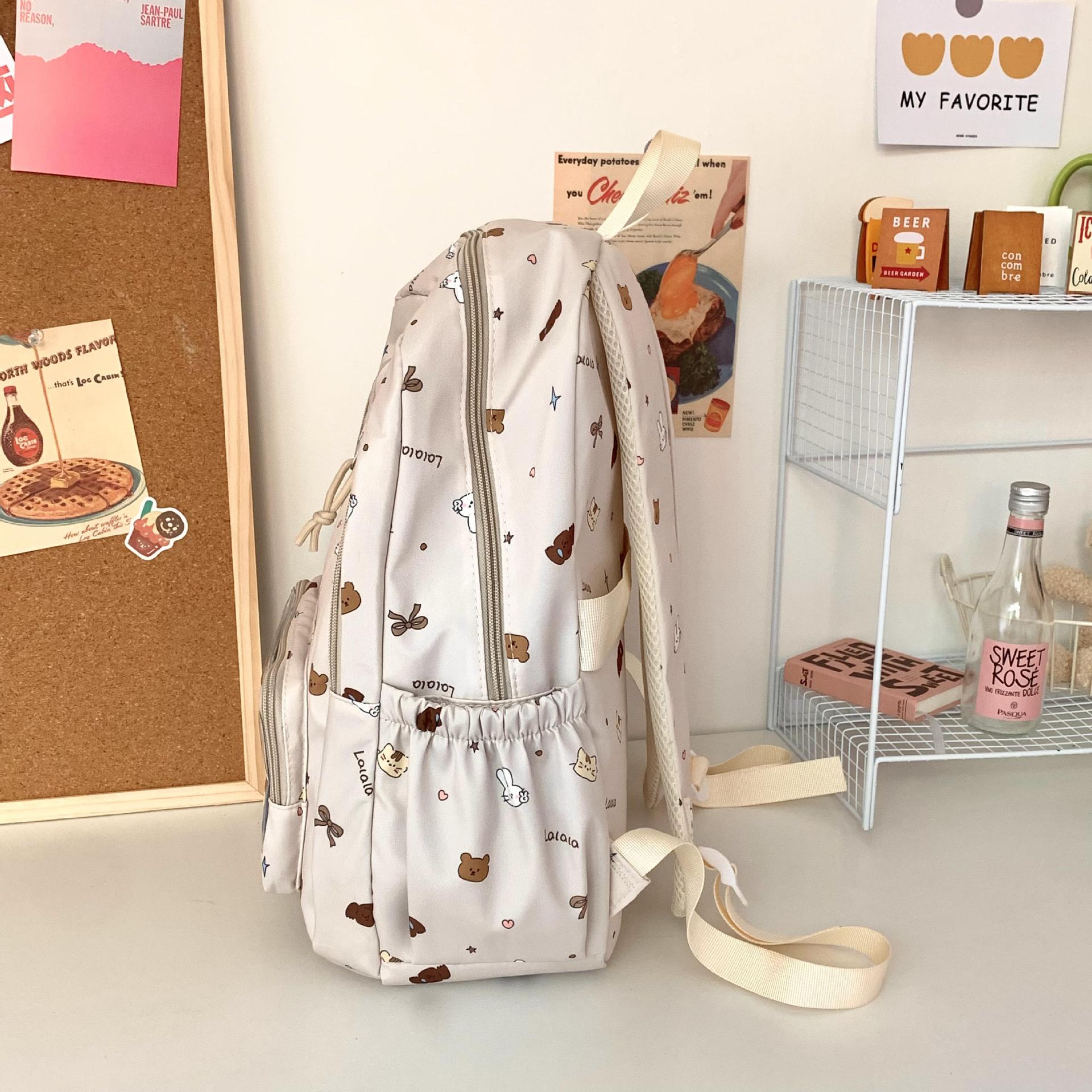 Mochila linda mochila escolar de gran capacidad 2024 mochila nueva bolsa de estudiante de secundaria y preparatoria bolsa de dolor casual al por mayor