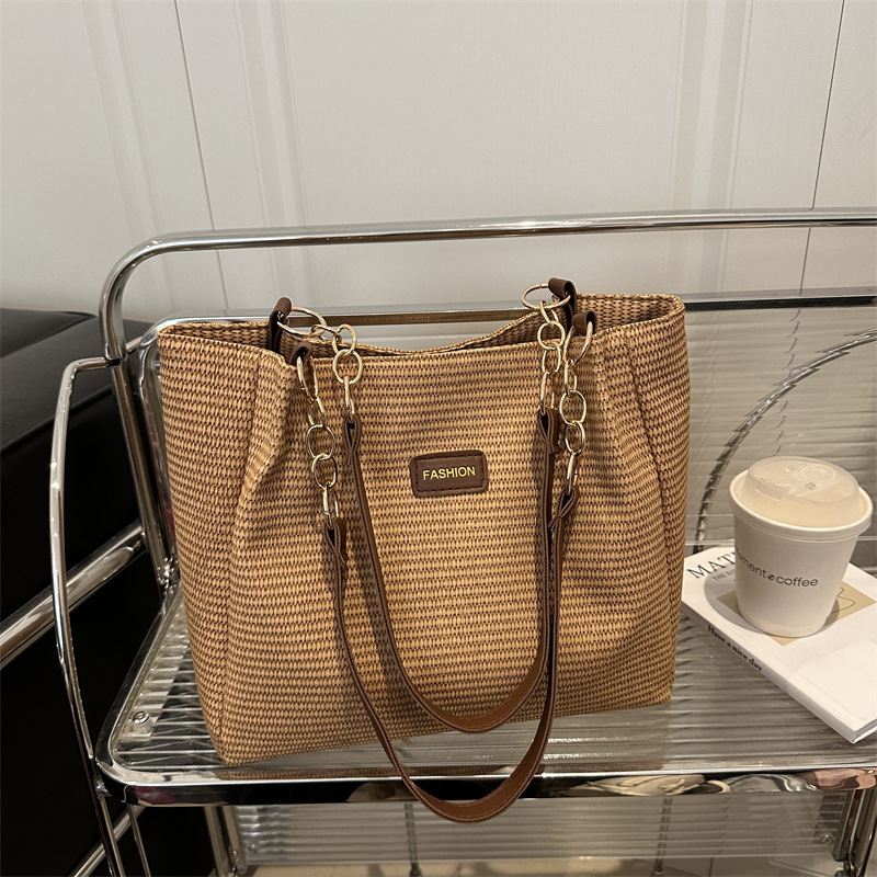 Bolso de viaje de gran capacidad para mujer 2025 verano nuevo estilo de alta gama bolso de axila de un solo hombro popular de este año bolso Tote femenino