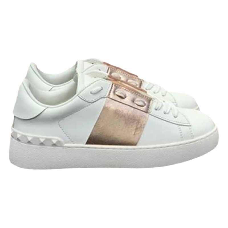 Comercio exterior V casa zapatos deportivos casuales remache zapatos blancos tendencia de moda de cuero pareja zapatos individuales hombres y mujeres zapatos del mismo estilo image 1