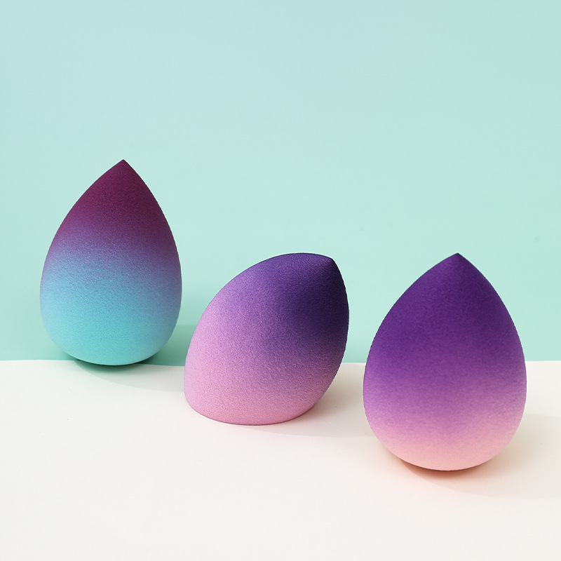 Huevo de belleza de color degradado, soplo de polvo, poliuretano transfronterizo, gotas de agua, esponja de maquillaje, maquillaje, fábrica de huevos, venta al por mayor personalizada