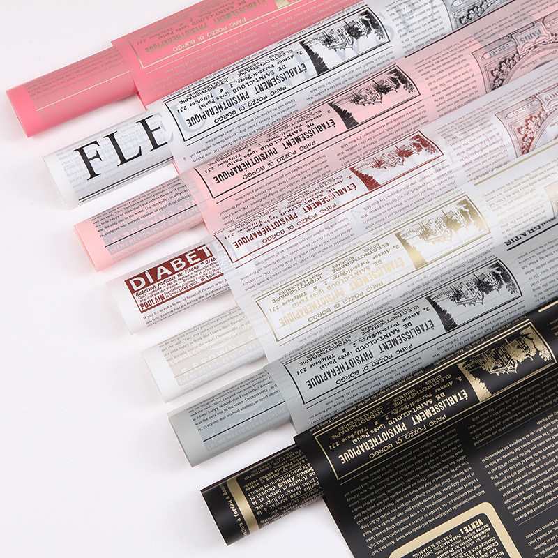 Fabricante spot al por mayor nuevo papel de embalaje de flores impermeable estilo europeo inglés coreano floristería ramo materiales de embalaje