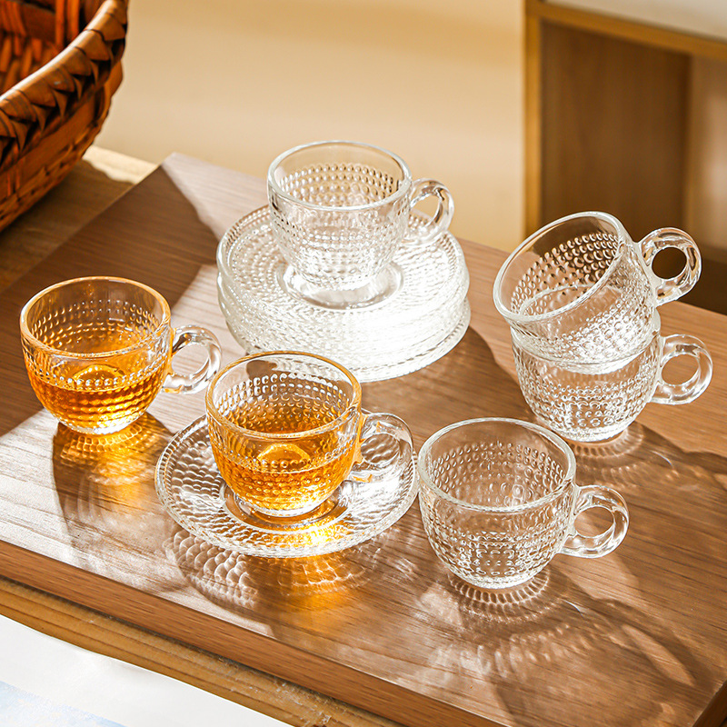 Juego de tazas y platillos de café de vidrio transfronterizo Taza de café con leche americana Taza de té transparente resistente al calor Taza de café de lujo europea