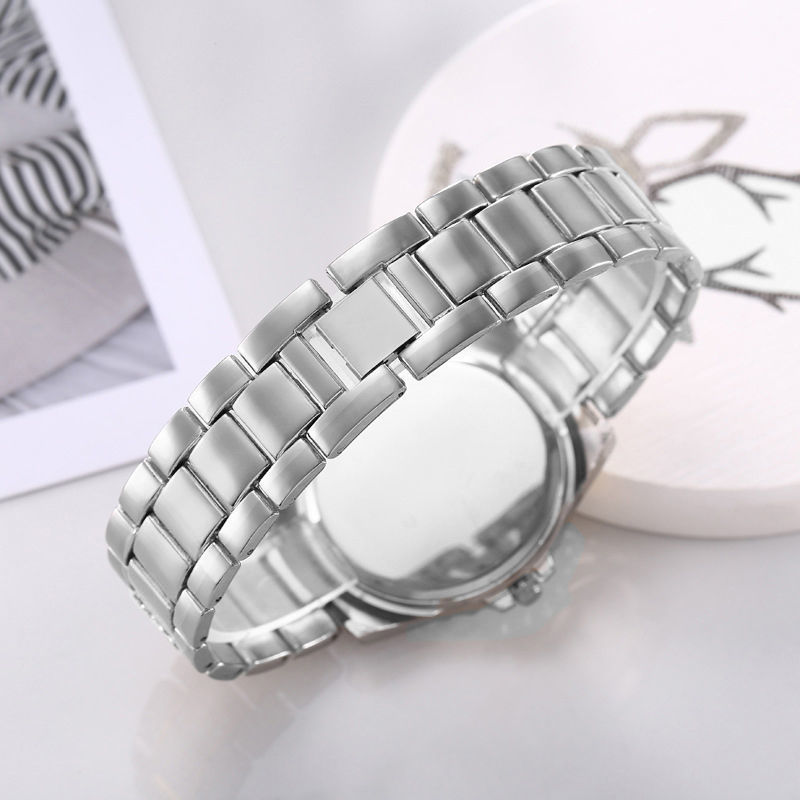 Reloj de cuarzo de negocios en línea celebridad empuje principal diamante rhinestone moda gran dial rhinestone romano literal correa de acero reloj chica