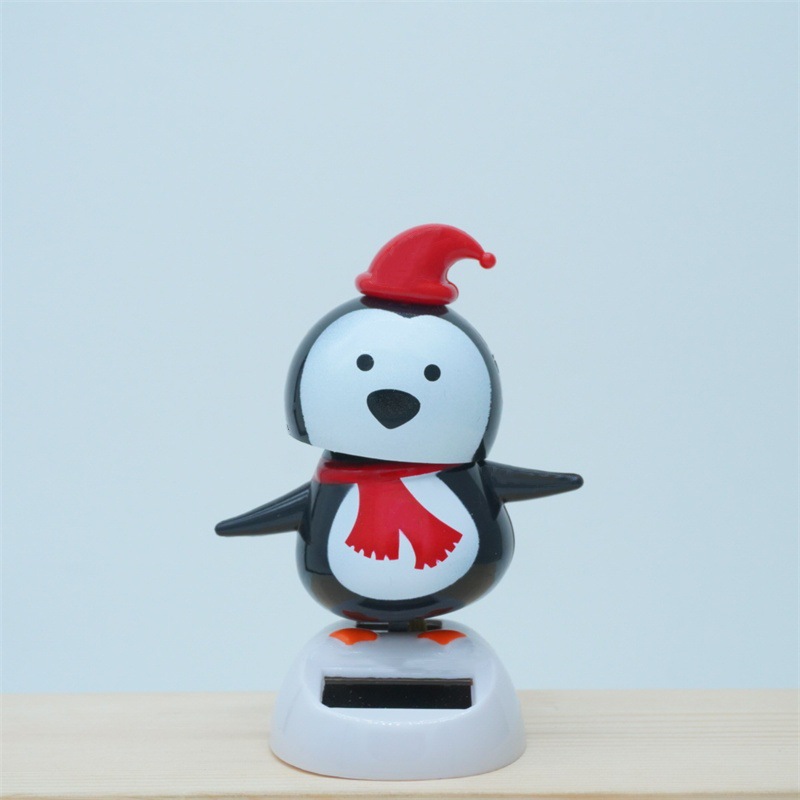 Cross-border Christmas solar energy automatic swing doll car interior shake head decorations creative car car ornaments
