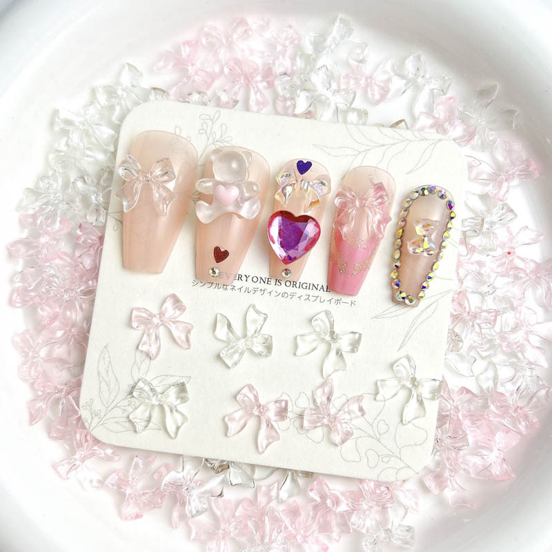 Cross-border hot-selling nail jewelry pink transparent ice through bow tie resin nail decoration live wholesale