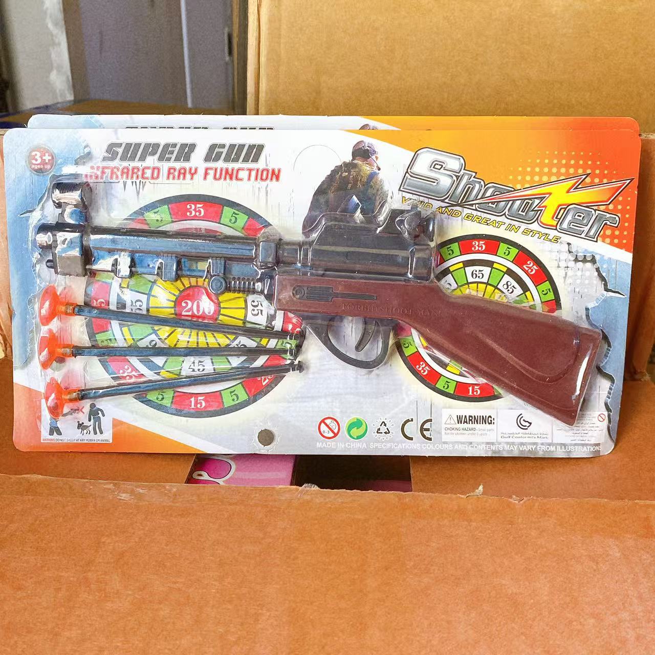Nuevos juegos de juguetes para niños para jugar con pistolas de succión de plástico 2 juguetes de plástico de dibujos animados coloridos al por mayor