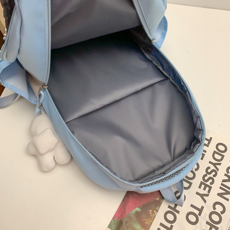 Nueva mochila estilo Coreano simple hombre y mujer estudiante mochila de gran capacidad mochila de la computadora de viaje de ocio