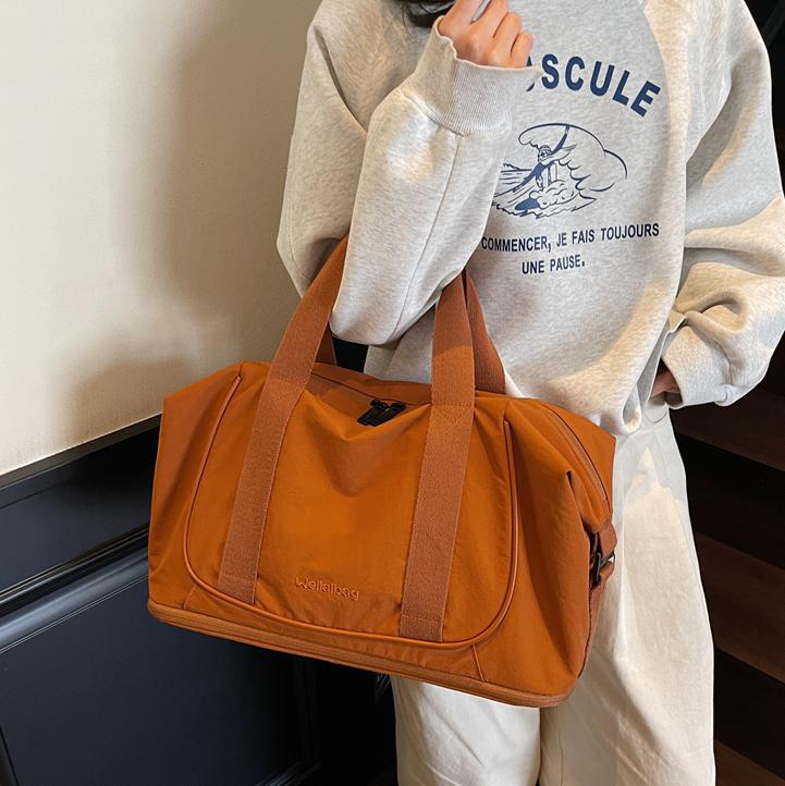 Bolso de viaje portátil coreano transfronterizo nuevo bolso de gimnasio ligero de gran capacidad bolso de viaje de viaje simple de ocio