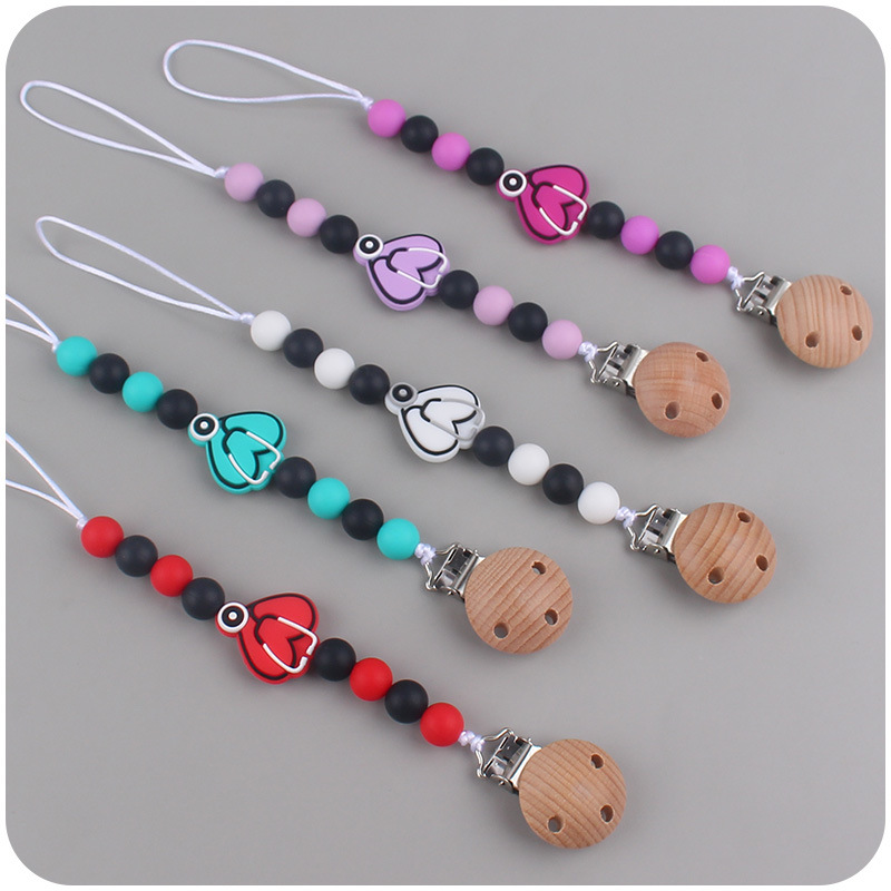 Nuevo bebé suministros de dibujos animados mariposa silicona mordedor calmante bebé DIY mordedura pegamento cadena anti-gota cadena