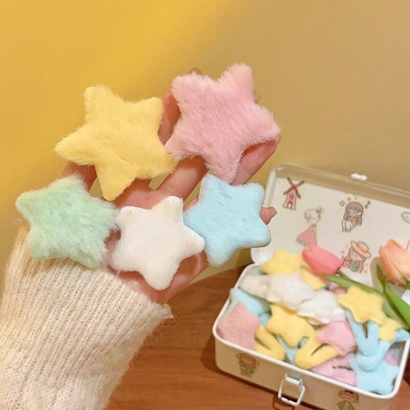 甘くて可愛い星のヘアピンの少女の毛の側の前髪は秋冬の毛のカードのネットの赤いクリップのカモの口を挟みます。|undefined