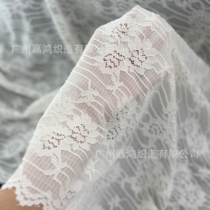 2026 nuevo tejido de encaje elástico chaqueta interior de mujer con fabricantes de vestidos de tela spot