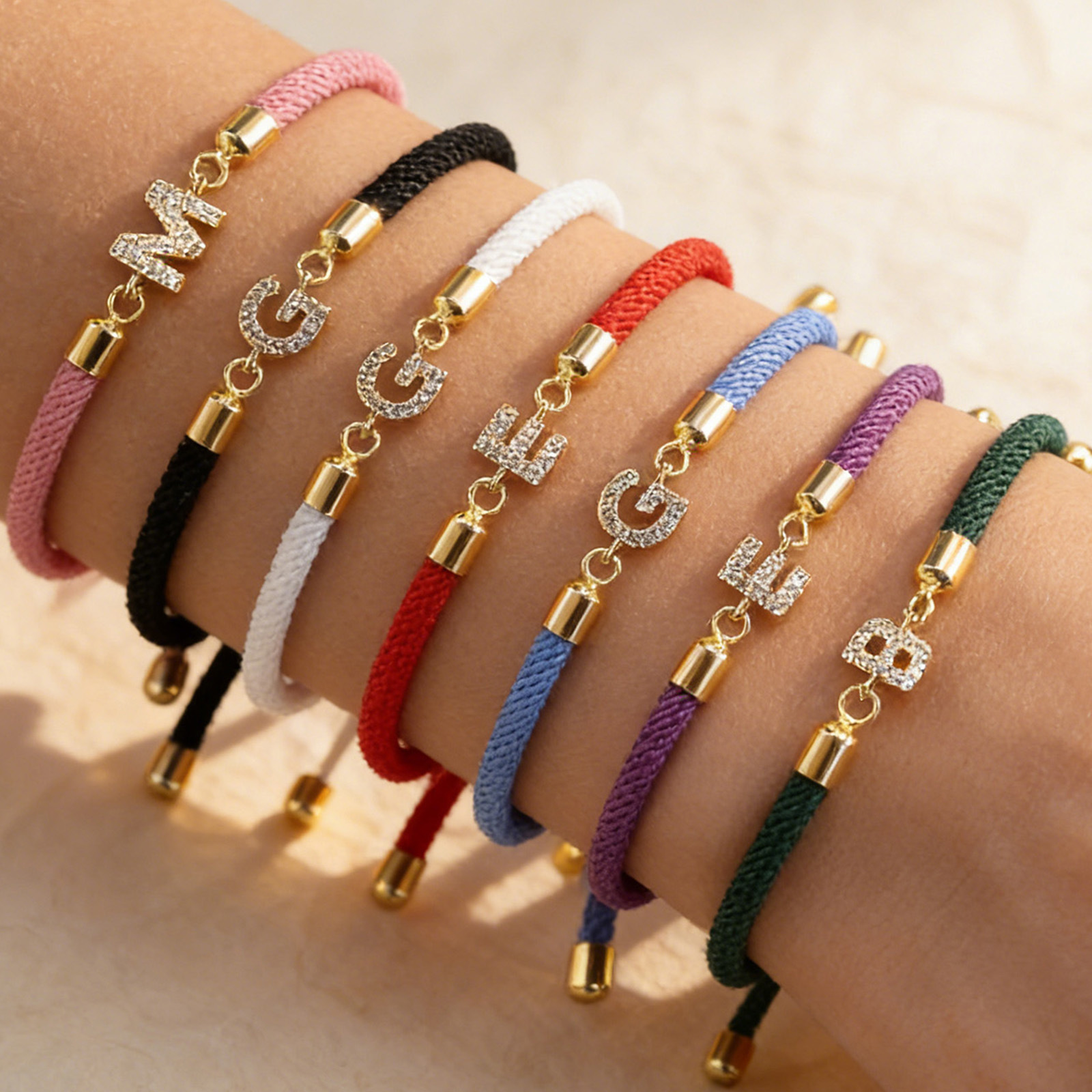Copper bracelet with letters with zircon