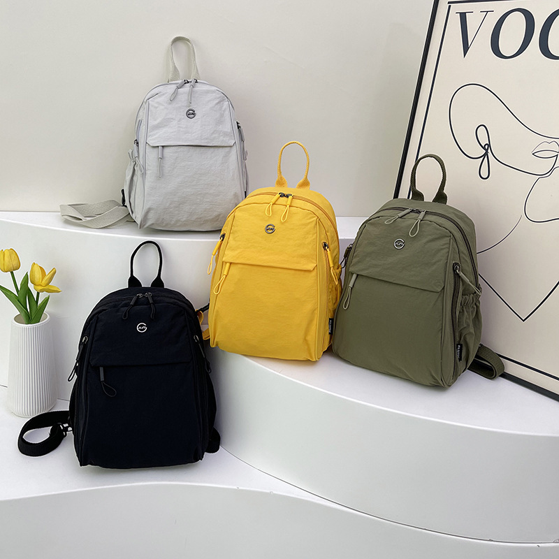 大容量バックパック女性の新しい軽量ナイロン布シンプルなトラベルバッグ女性のトレンディな多用途カジュアルバッグ小さなバックパック|undefined