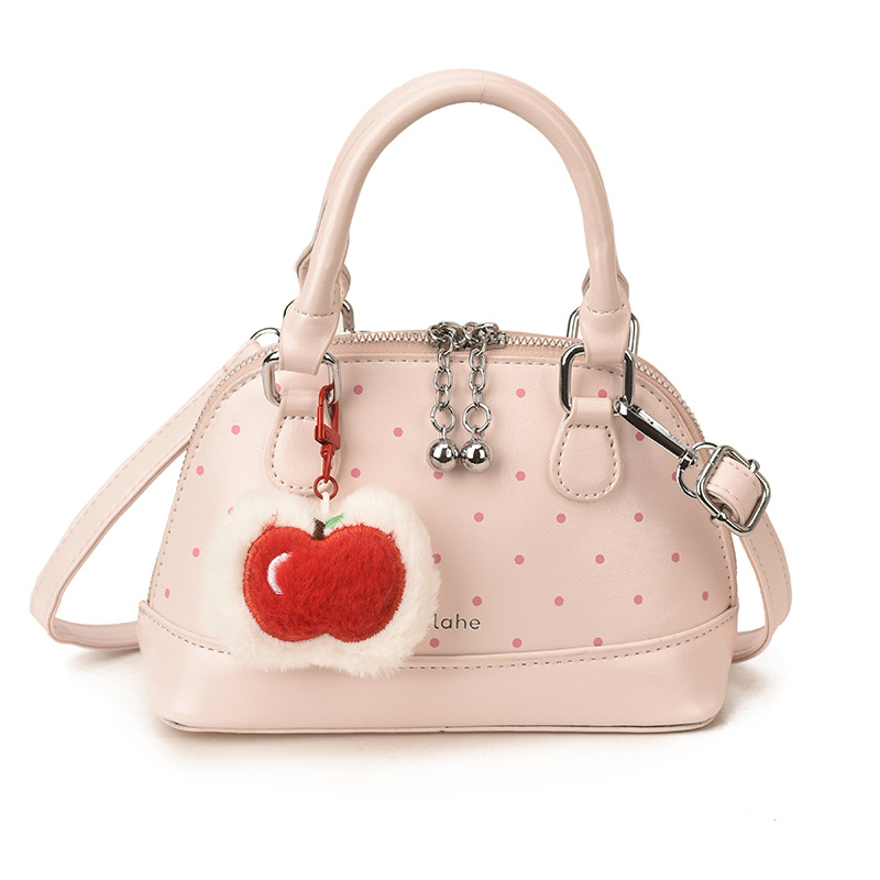 Bolsas coreanas para niños y niñas, bolsas de conchas, bolsas de mano de manzana, bolsas para niños, bolsas de comercio exterior transfronterizas 2026