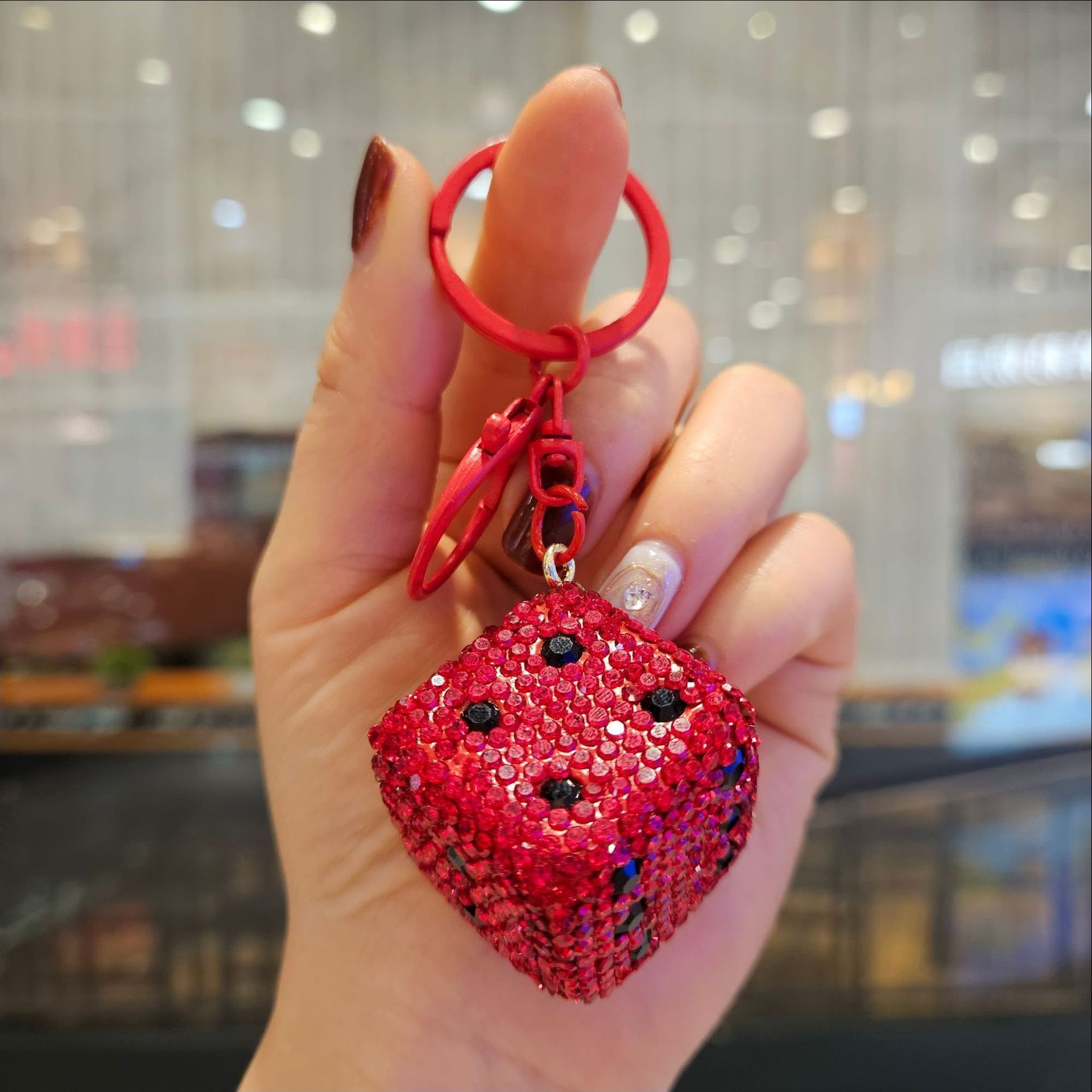 Diamond-encrusted dice—red