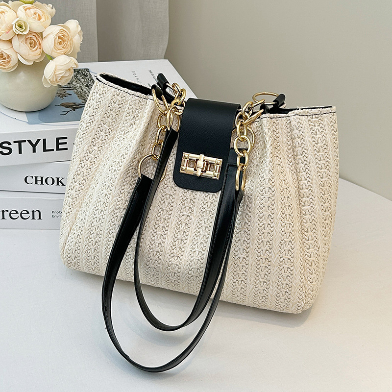Bolsas de tejido transfronterizas de mujeres 2025 nueva bolsa de hombro de gran capacidad bolsa de vacaciones de playa bolsa de paja al por mayor