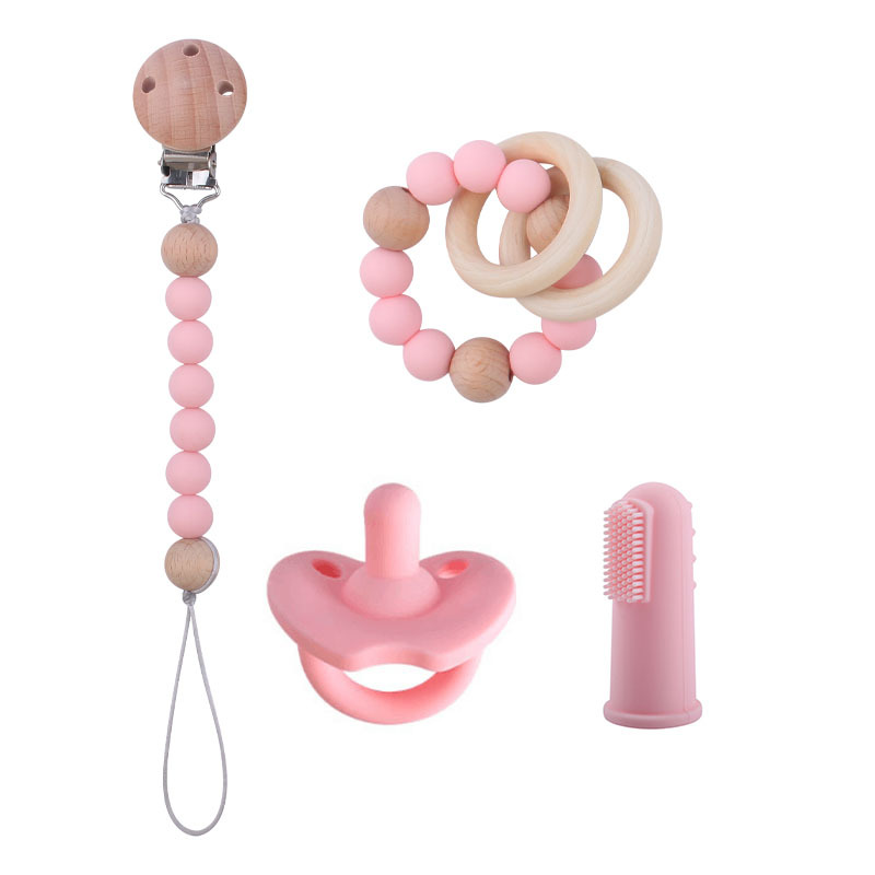 Nuevo bebé suministros de silicona de cuatro piezas conjunto chupete bebé silicona pezón pulsera dedo manga cepillo de dientes pezón cadena