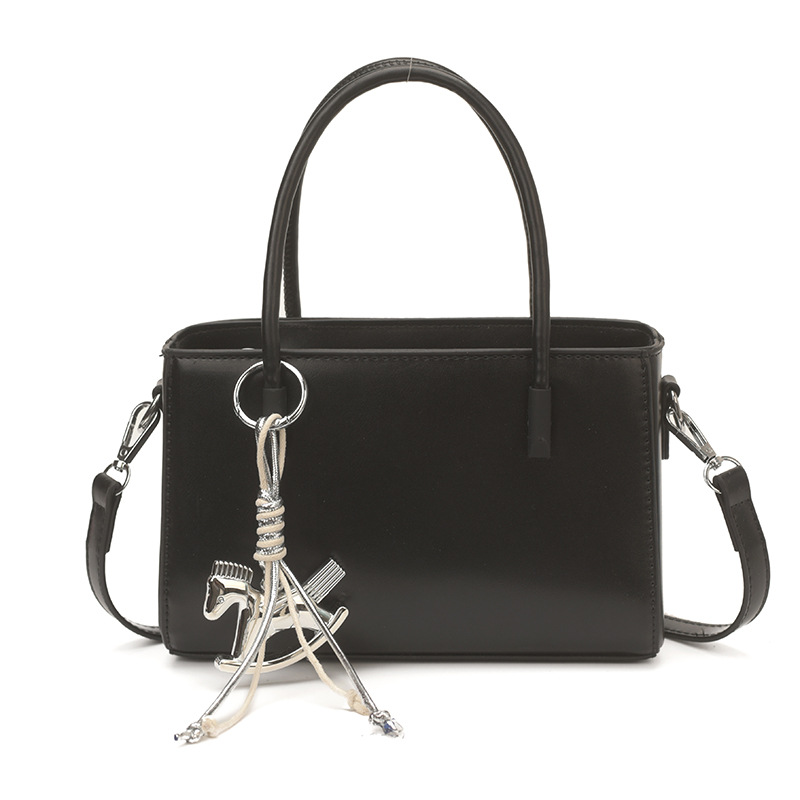 Diseño coreano de nicho bolso de mano casual para mujeres 2026 verano diario nuevo estilo de moda bolso de transporte