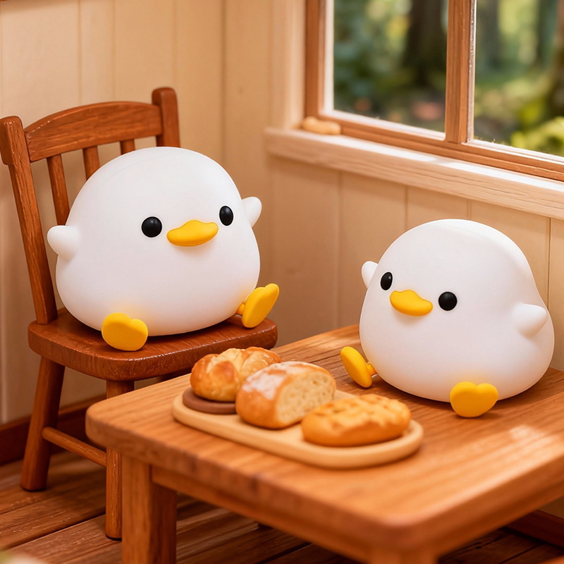 Lámpara de noche del pato lindo dormitorio lámpara de cama lámpara recargable de silicona lámpara de regalo de cumpleaños lámpara de palpitación