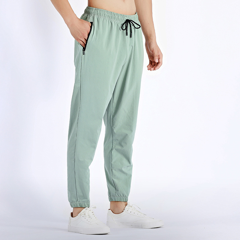 Otoño e invierno Pantalones deportivos al aire libre deportes correr pantalones de hombre ropa casual pantalones de fitness de secado rápido pantalones de chándal de baloncesto pantalones atados al tobillo