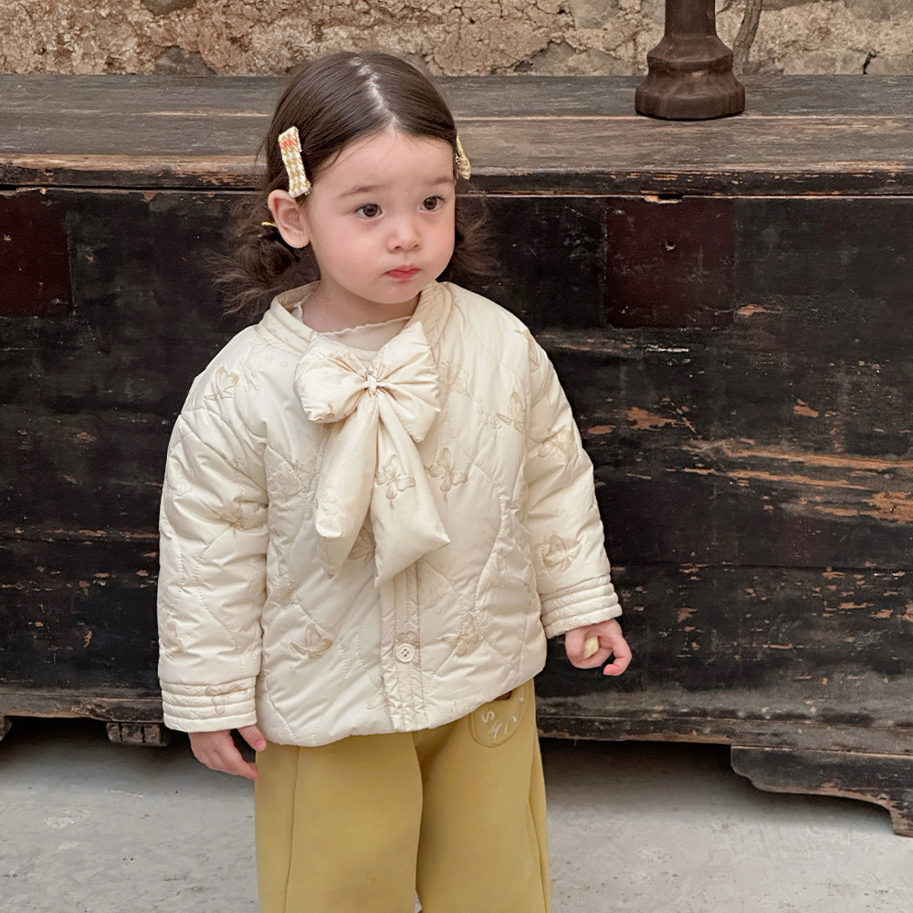 Vestido de un año de niña de estilo chino nuevo rosa, mujer bebé otoño e invierno acolchado grueso de manga larga chaqueta de algodón con lazo grande