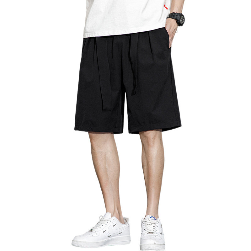 Pantalones cortos de moda de verano masculinos sueltos de color sólido, pantalones deportivos casuales de cinco puntos, pantalones grandes delgados de estilo de Hong Kong
