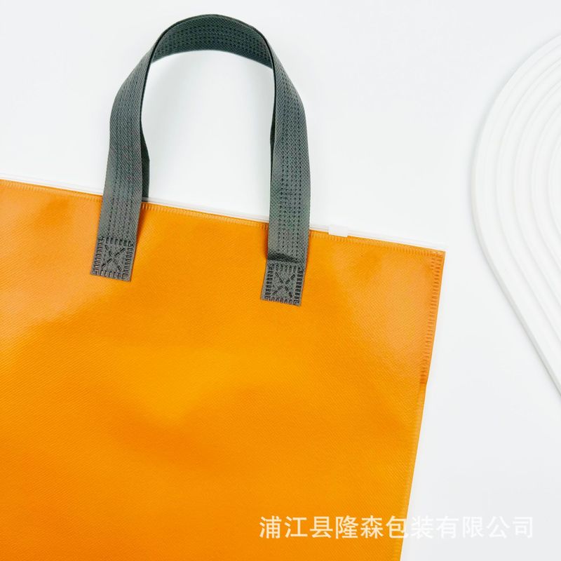 服装通用服饰手提拉链袋 打底裤棉裤无纺布手提袋 保暖内衣包装袋|undefined