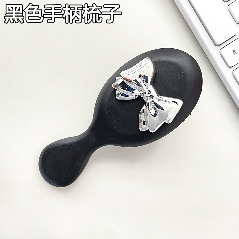 漫画かわいい蝶結びエアバッグ櫛ミニ折り畳みエアクッション櫛ソフト妹携帯マッサージ櫛小櫛卸売り|undefined