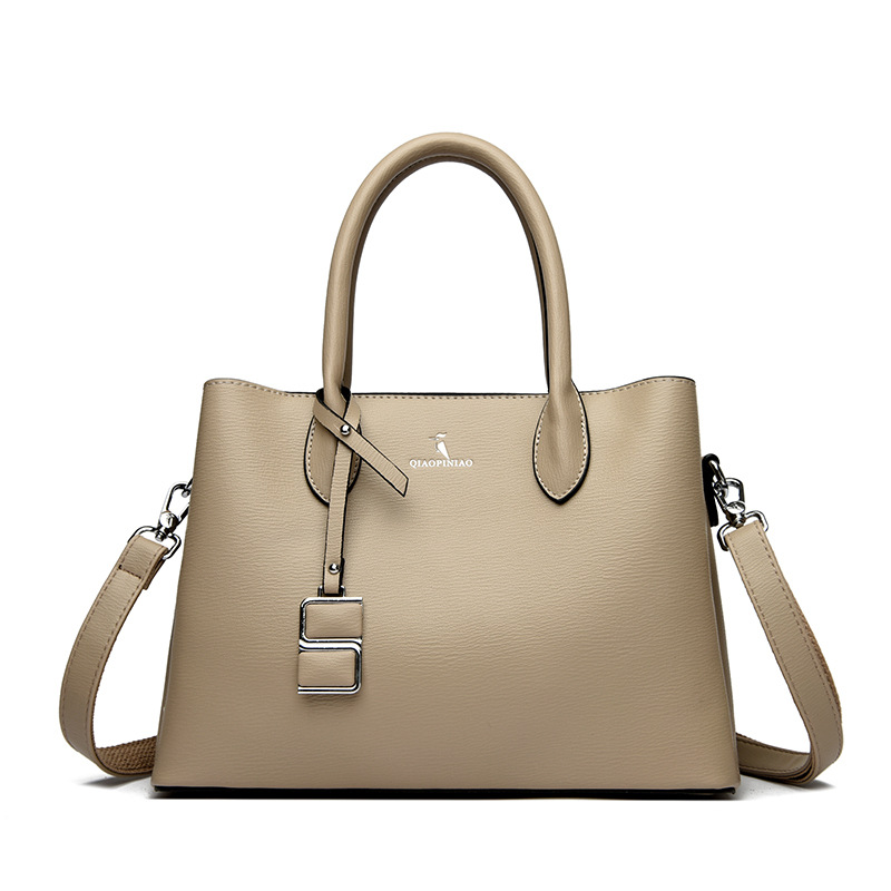 Nuevo bolso de mujer simple de moda, bolso de mano de cuero suave de gran capacidad, bolso de tela de mujer, bolso de canguro