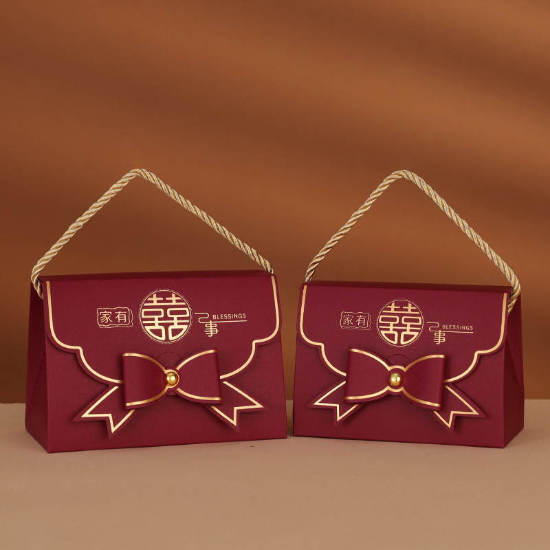 Caja de dulces de boda Boda 2024 Nuevo caramelo portátil de alta gama Empaquetado de dulces de boda Caja de regalo Bolsa vacía