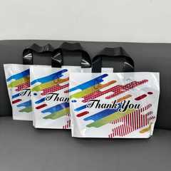 クロスボーダーホリデーギフト用の厚みのあるプラスチック衣料品店婦人服店衣料品ハンドバッグ包装ショッピング収納袋