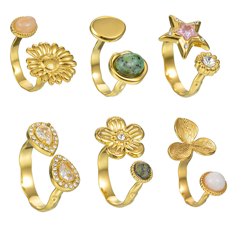 Diseño de nicho de alto grado flor ZIRCON anillo abierto luz femenina estilo de lujo europeo y americano elegante anillo ajustable de acero de titanio