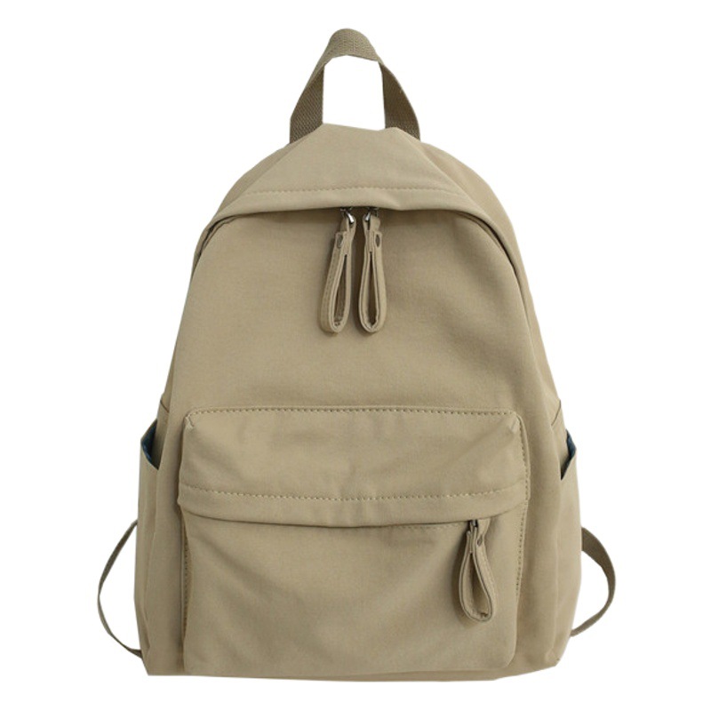 Mochila fabricante spot tendencia pareja de hombres y mujeres con el mismo estilo mochila escolar pequeña fresca de color sólido mochila de algodón de seda fresca para estudiantes