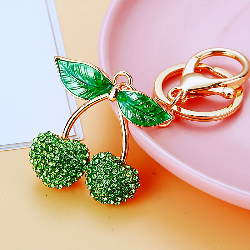 Creativo lindo diamante fruta pequeño limón llavero del coche bolso de las mujeres colgante de metal llavero anillo de regalo de dibujos animados