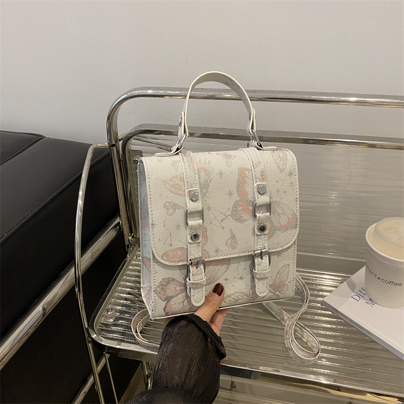 2024 nueva impresión universal mini bolso nuevo estilo chino chino de alto nivel de estilo extranjero nicho mochila mujer