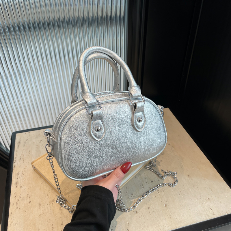 2024 nuevo temperamento diseño de moda bolso de hombro de color sólido estilo retro cremallera concha textura mochila