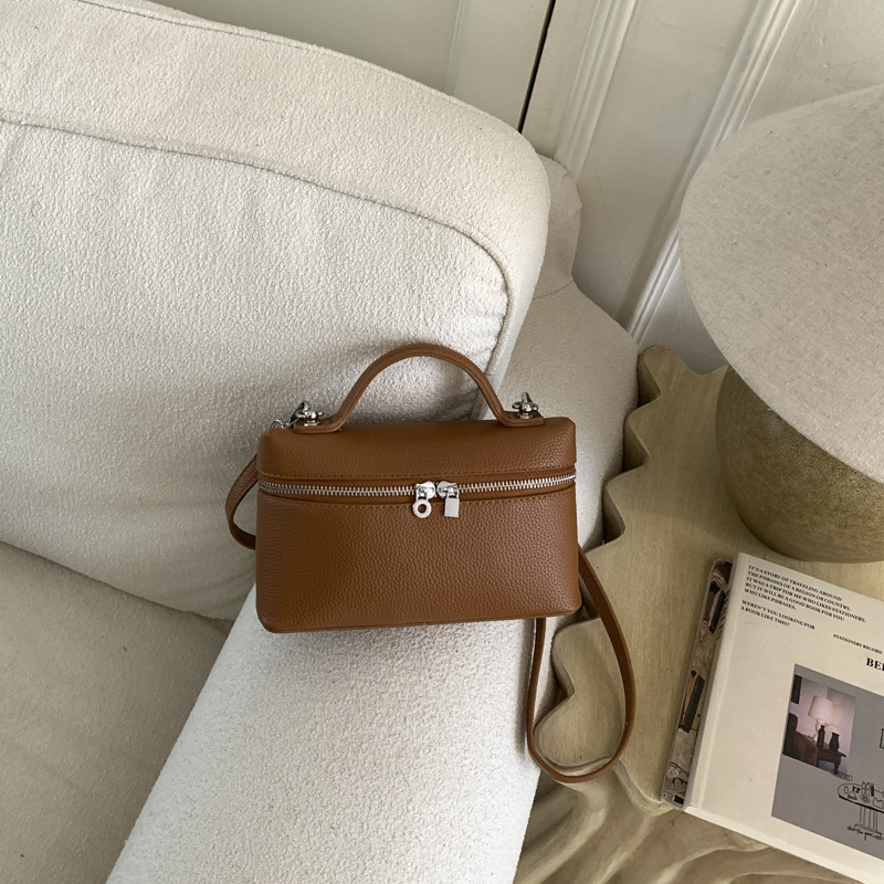 Nicho Zhong bolso de almuerzo portátil para mujeres 2026 nuevo litchi estampado mochila de hombro bolso tridimensional bolso de caja de moda