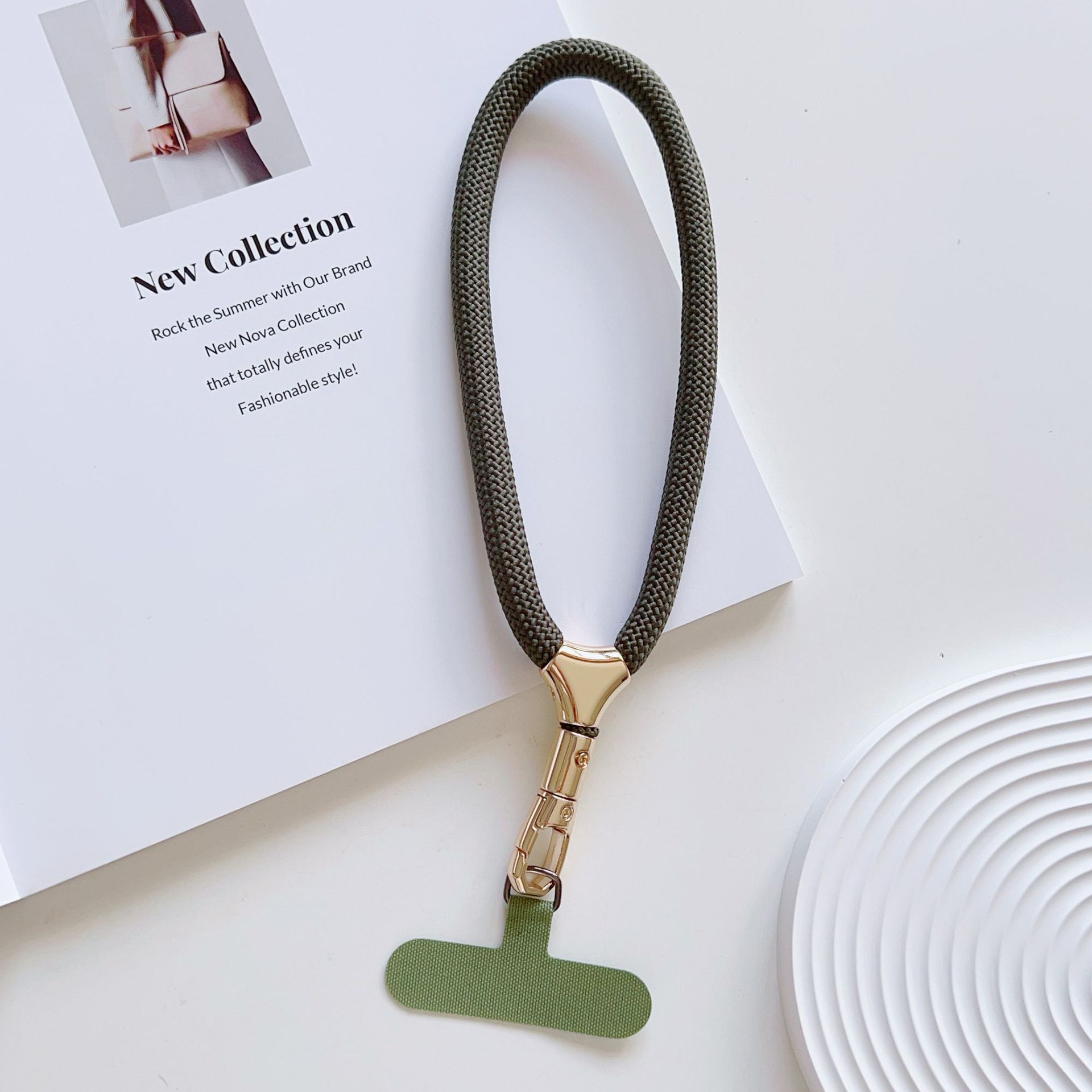 Cuerdas de muñeca ajustables de alta calidad con clips de hebilla pequeñas y frescas de poliéster corto para colgar teléfonos móviles simples y versátiles