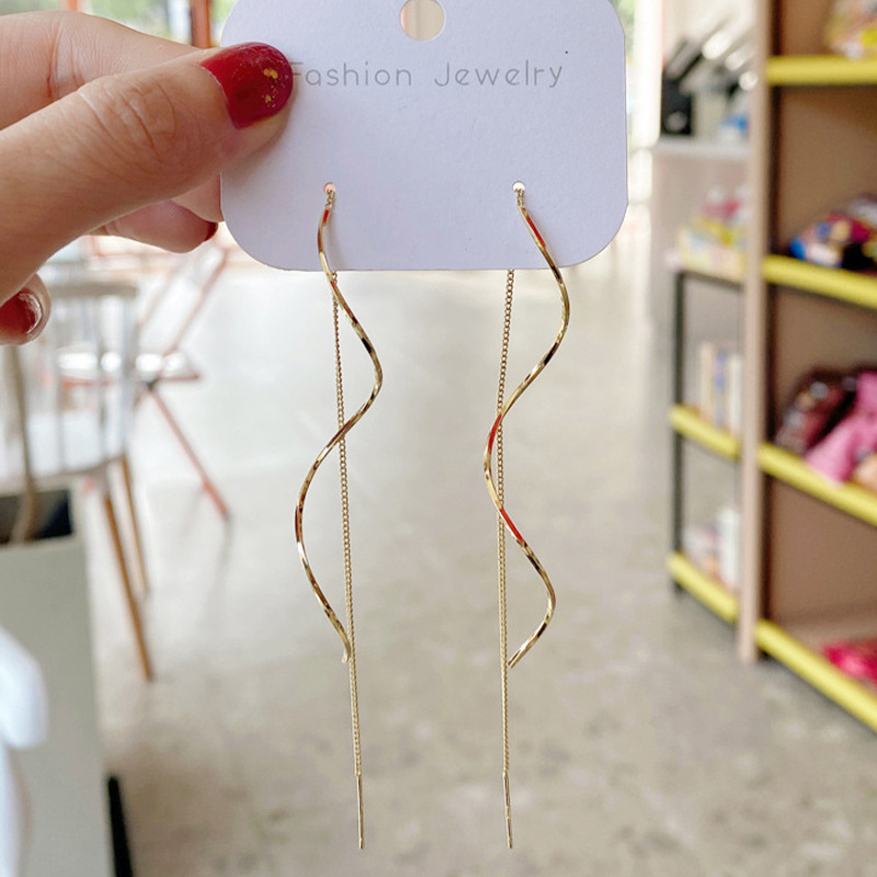 ondas largas simples pendientes de orejas para mujeres 2024 nuevo estilo de moda espiral perilla de aire pernos de orejas image 7