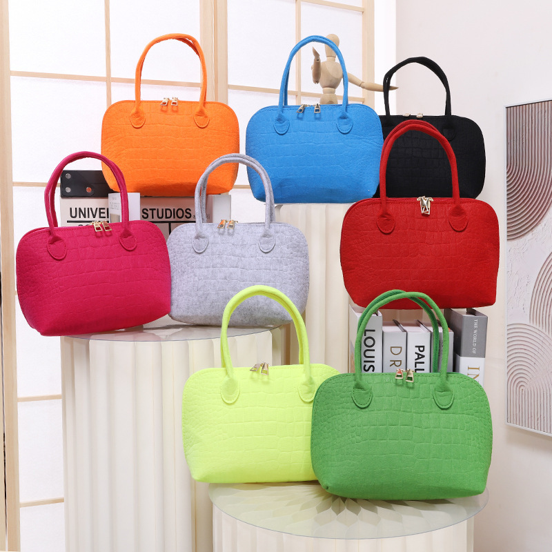2025新款纯色毛毡包女士包潮流压纹毛毡手提包休闲简约手拎包批发